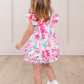 Ruffle Bubble Romper - Hibiscus